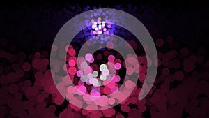 Endless beautiful small circles of pink and purple color illuminated by a flashlight flare, seamless loop. Animation