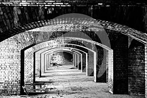 Endless brick passage with repeating archways in Fort Jefferson on Dry Tortugas National Park.