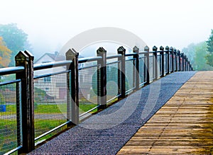 Endless bridge mist over lake