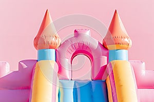 Endless Fun Vibrant Inflatable Castle on a Pink Background