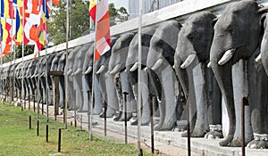 Endless line of carved elephants