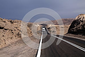 Endless Panamericana Ruta 5 through barren landscape in North of Chile, Atacama desert photo