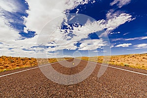 Endless road, no traffic, Highway 24, Emery County, Utah, USA