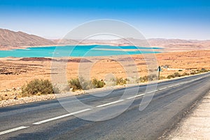 Endless road in Sahara Desert with blue sky,Morocco Africa