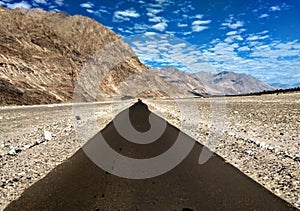 endless road view in the lap of barren lands