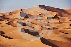 Endless Sands of the Sahara desert. Beautiful sunset over sand dunes of Sahara Desert Morocco Africa