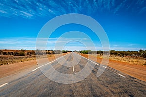 Endless straight road in Western Australia close to Billabong Roadhouse