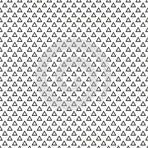 Endless texture made of equilateral black triangles on white background photo