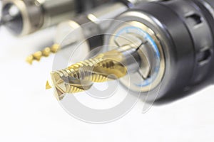 Endmill and drill on white background