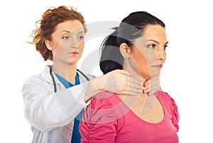 Endocrinologist examine thyroid woman