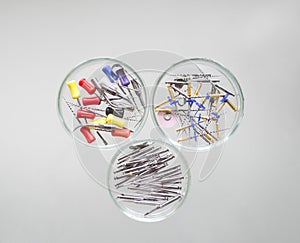 Endodontic Equipment:Dental borers and Root Canal Files Protaper in Petri dish glass