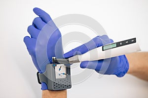 Endodontic tools close up. An endodontist physician places the endodontic instruments in a sterile box. A set of hand photo