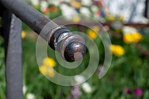 The endpiece of an old metal railing