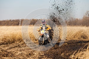 Enduro bike racer in a field