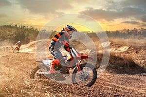 Enduro bike rider on offroad track