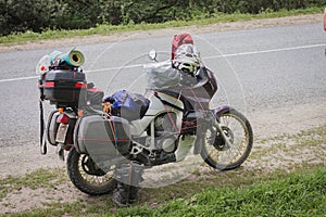 Enduro loaded motorcycle. All is packed at once.