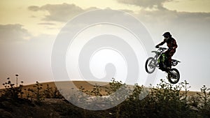 Enduro Rider jumping hill