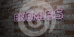 ENEMIES - Glowing Neon Sign on stonework wall - 3D rendered royalty free stock illustration