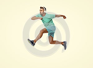 energetic athletic man sport runner sportsman running and joggig in sportswear has stamina isolated on white background photo