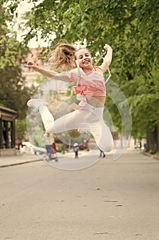 Energetic child. Save energy for long walk. Full of energy. Girl carefree child. Kid long hair enjoy walking. Summer