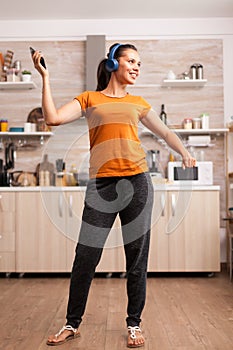 Energetic dancing in kitchen