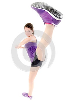 Energetic girl doing kick