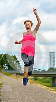 Energetic motivated exuberant middle-aged woman photo