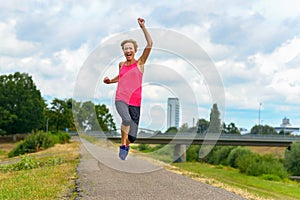 Energetic motivated exuberant middle-aged woman photo