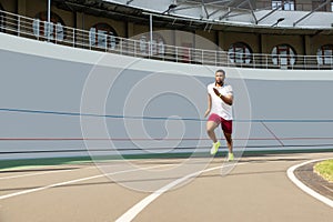 Energetic purposeful fit young man in sportswear