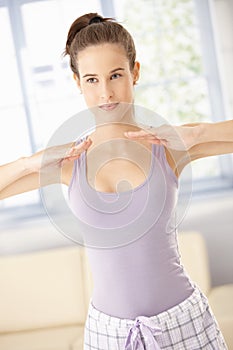 Energetic woman exercising in morning