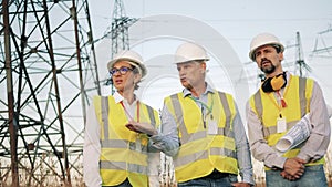 Energetics workers are planning a project near electrical towers