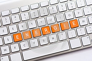 ENERGIE writing on white keyboard photo