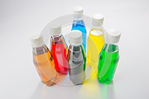 Energy drinks in colorful plastic bottles.