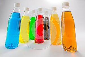 Energy drinks in colorful plastic bottles.