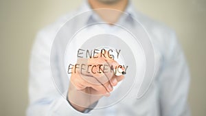 Energy Efficiency, man writing on transparent screen