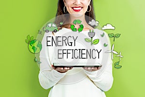 Energy Efficiency with woman holding a tablet photo
