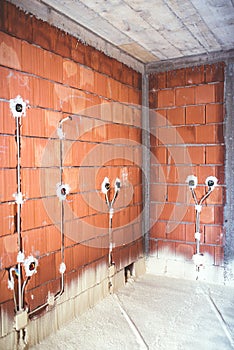 Energy efficient house, built with quality materials, thermal insulation and brick walls with plugs and electricity pipes