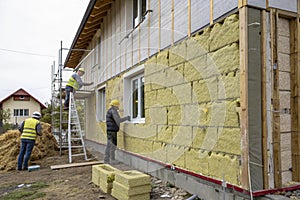 Energy-efficient house wall insulation under construction