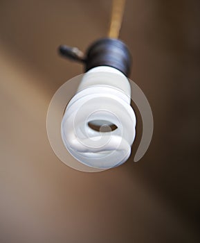 Energy Efficient Lightbulb Hanging From Ceiling