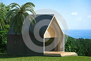 Energy efficient wooden house on the hill above the ocean