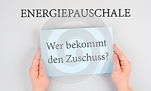 Energy flat rate, who receives the subsidy is standing in german language on the paper, finanical help for increasing prices
