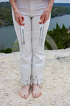 Energy Healer Holding Tuning Forks