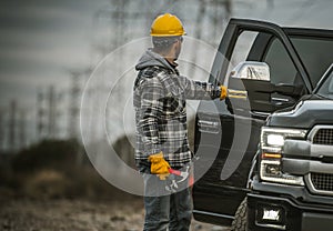 Energy Industry Worker Next to His Pickup Truck