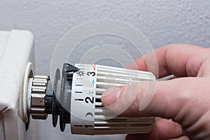 Energy prices increase and energy consumption turning on a thermostatic regulator