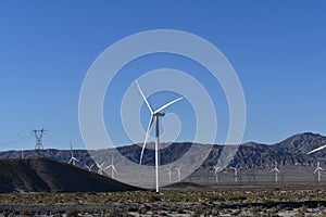 Energy Producing Windmill Farm with mountains