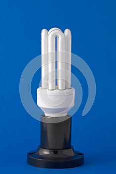 Energy saving bulb on the background
