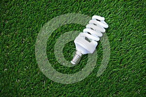 Energy saving bulb in the grass