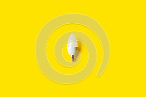 Energy saving concept. led lamp on a yellow background
