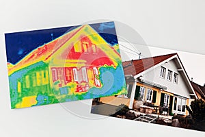 Energy saving. house with thermal imaging camera