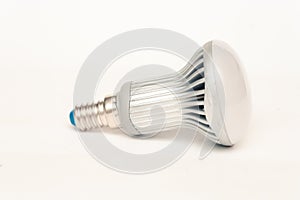 Energy saving LED light with bulb E27. Image on white background side view